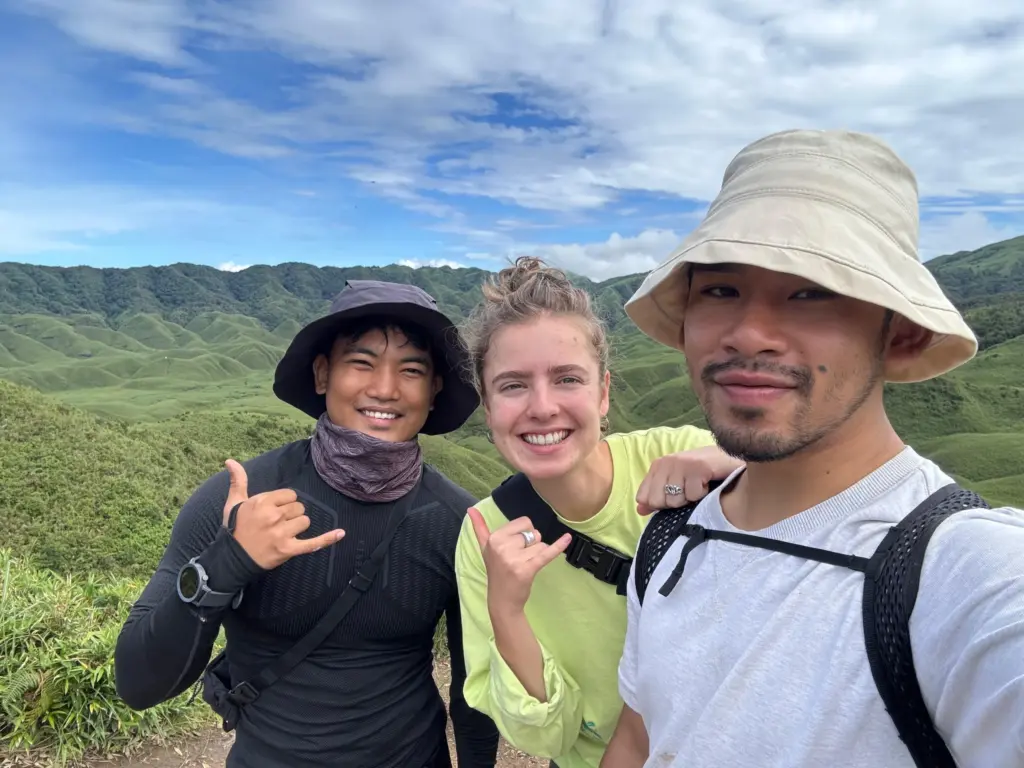 Traveller with local Naga guides in Dzukou Valley